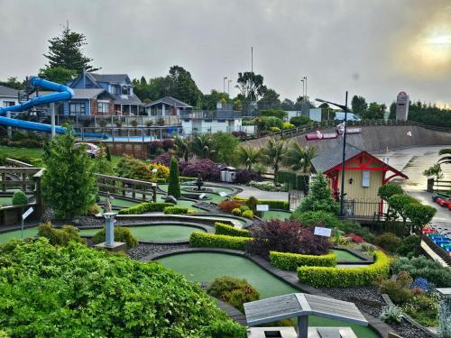 Family enjoying the luge and mini putt